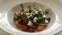Salade de pastèque et tomates cerises au vinaigre balsamique blanc et huile d’olive extra-vierge